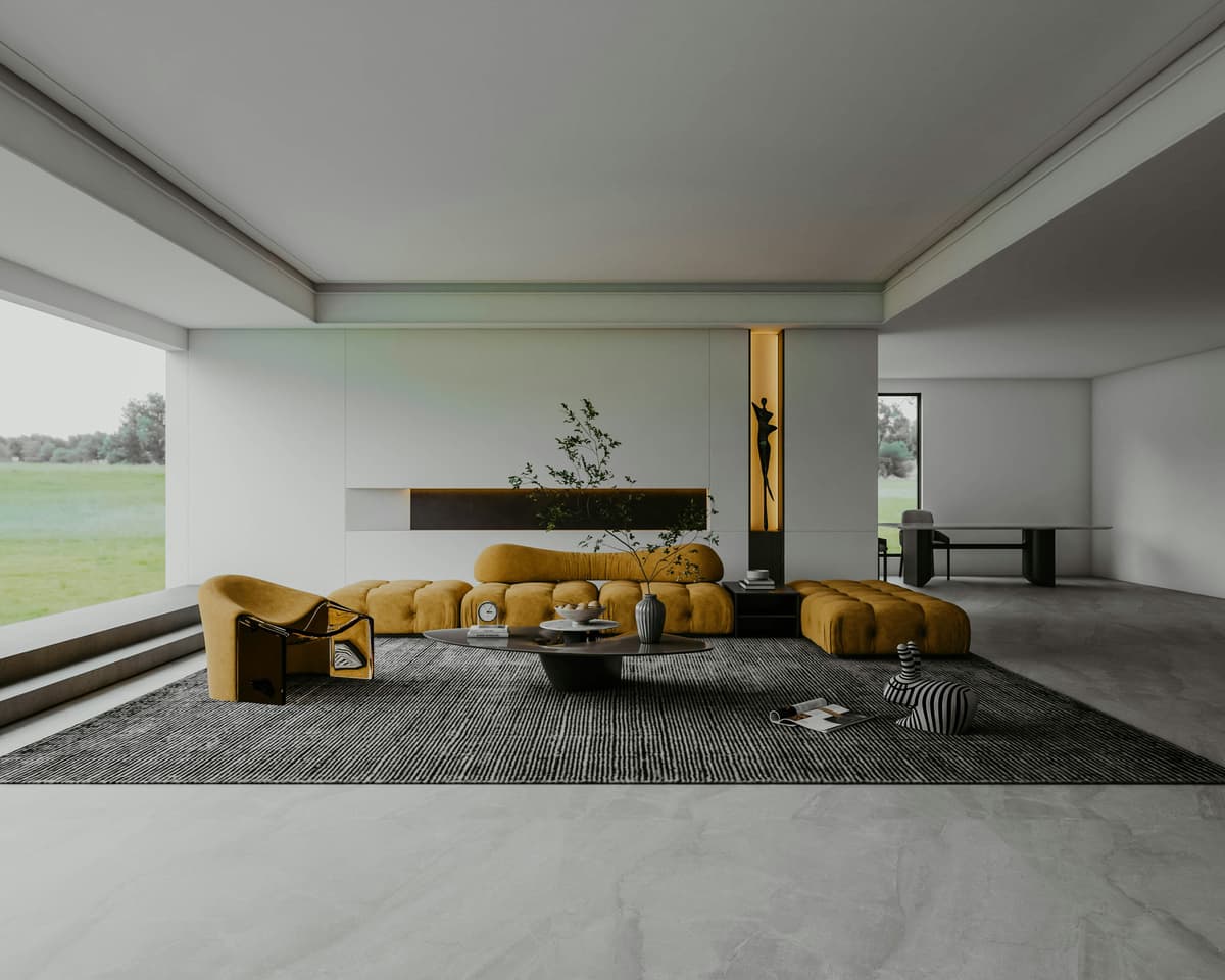 Open-plan living space with white painted walls and a view to the garden